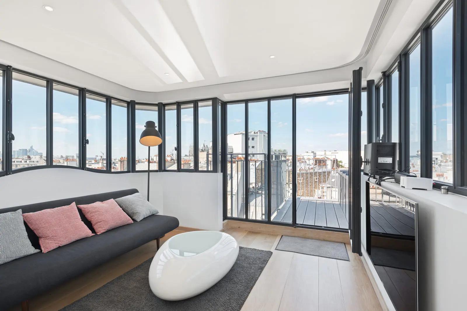 Living room in Modern loft with 360° view of Paris & the Eiffel Tower - 1